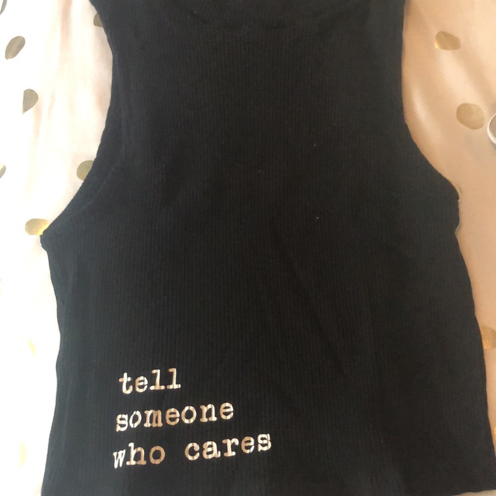 Black ribbed tank with white lettering